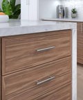 Roosevelt Collection Brushed Nickel Cabinet Handle Five And One Sixteenth Inch Center To Center Bar Pull on kitchen drawer
