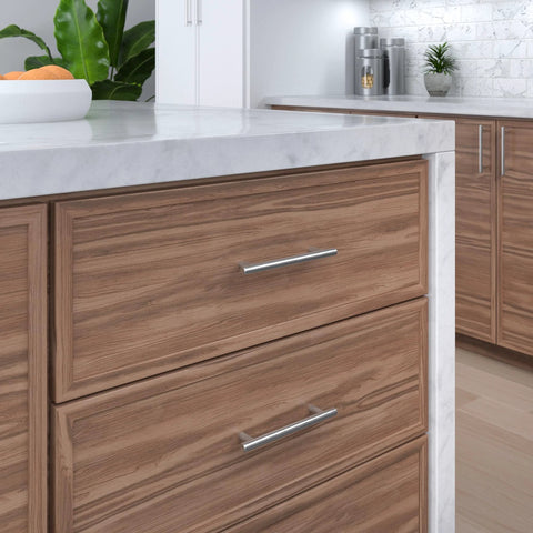 Roosevelt Collection Brushed Nickel Cabinet Handle Five And One Sixteenth Inch Center To Center Bar Pull on kitchen drawer