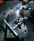 Heavy Duty 3.2 Inch Throat Depth Welding Clamps With Solid Chromium Vanadium Steel Grip used on a workbench during MIG welding.