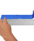 Person measuring fabric with Stainless Steel Ruler With Non Slip Cork Base 6 Inch For Pro-Grade DIY Crafting And Drafting Warp Free And Bend Resistant.