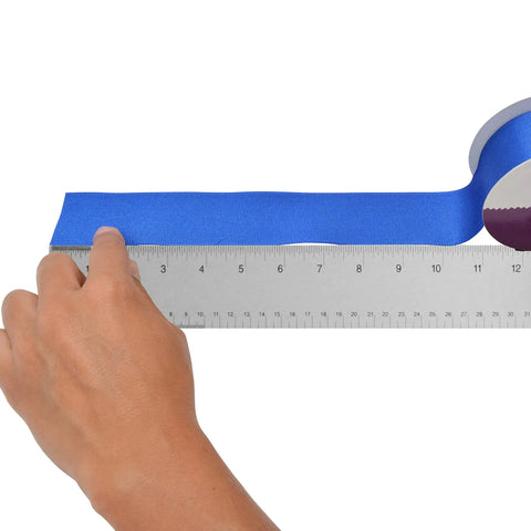 Person measuring fabric with Stainless Steel Ruler With Non Slip Cork Base 6 Inch For Pro-Grade DIY Crafting And Drafting Warp Free And Bend Resistant.