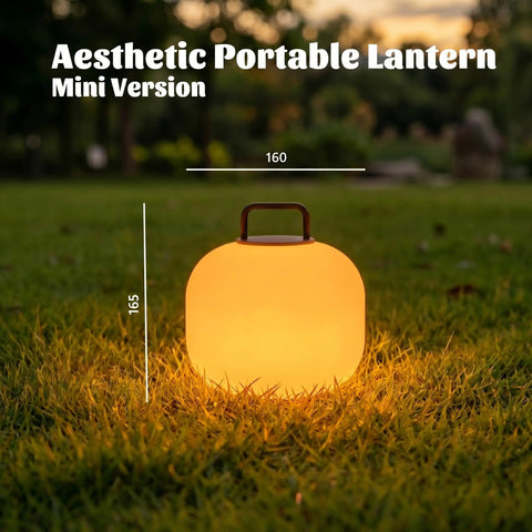 Cordless RGBW LED Table Lamp With Remote Control, Portable Outdoor Lantern on grass at sunset, mini version lit up