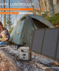 Ultra Portable Power Station 150W 155Wh Solar Generator near tent with MPPT controller and solar panel, outdoor camping scene