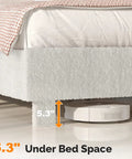 Under bed detail showing 5.3" clearance for cleaning, featuring White Queen Boucle Upholstered Platform Bed With Rounded Headboard Sturdy Wood Slats Plush Cloud Back Cushioning Straight Up Comfy Modern Bedroom Essentials.