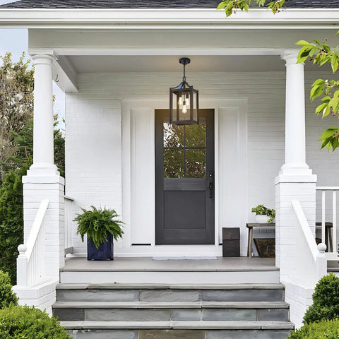 Straight Up Heavy Duty Outdoor Pendant Light With Automatic Dusk To Dawn Sensor 18.5 Inch Porch Chandelier illuminating front porch.