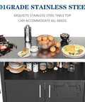 Ultimate Outdoor Grill Cart With Storage And Wheels, black steel worktop with food and utensils, visible stainless steel tabletop