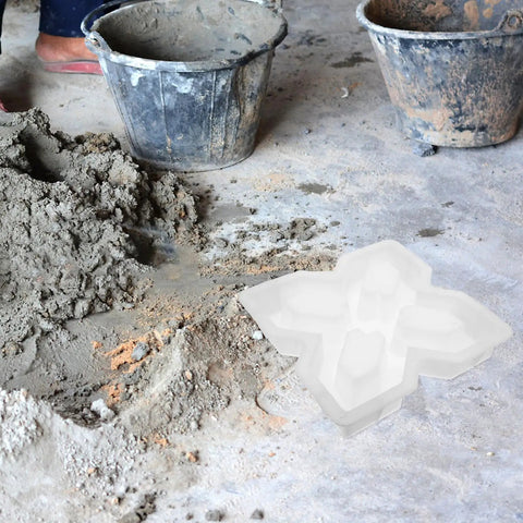 Concrete Paver Molds And Stepping Stone Set For Patio Pathway DIY Garden Decor Durable Plastic Cement Molds next to mixed cement