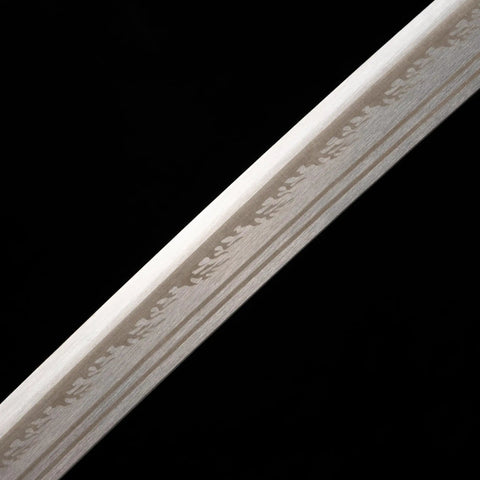 Close-up of Real Carbon Steel Katana blade for Iaido Practice and Display, showing intricate pattern details for collectors and enthusiasts.