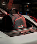 Fleece Lined Motorcycle And Racing Helmet Bag With Hidden Shoe Compartment Waterproof 600D Oxford Gear Carrier on car hood