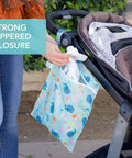 Waterproof Wet Dry Bag For Travel And Baby Gear, reusable ocean life print pouch attached to stroller with zippered closure.