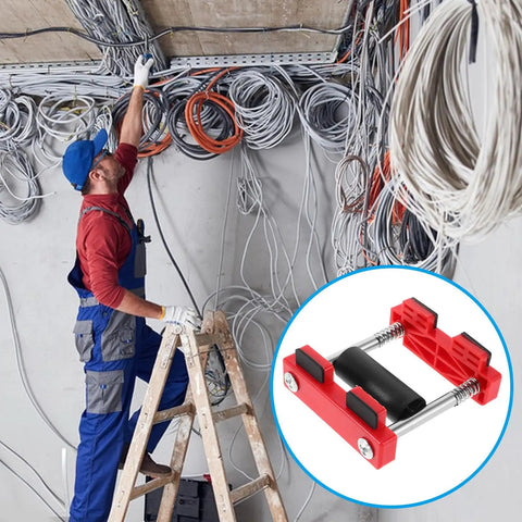 Electrician Pro Grade Cable Threading Tool With Time Saving Design And Versatile Compatibility For Wire And Cable Pulling In Junction Boxes And Sockets Smooth Cable Movement With Pulley System Easy One Handed Use In Durable Plastic And Steel Build. electrician using red plastic and steel cable threading tool on ladder in wiring room