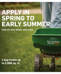 Person applying GrubEx1 Season Long Grub Killer For Lawns Kills Grubs When Young And Prevents Turf Damage For Up To 4 Months Covers 5,000 Sq Ft with spreader