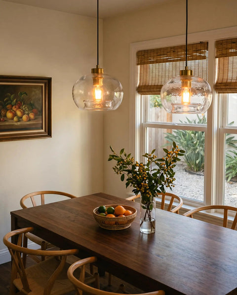 CASAMOTION Glass Pendant Lights, Textured Clear Globe Shade illuminating a rustic dining table with natural decor.