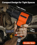 Heavy Duty 1/2 Inch Drive Pneumatic Impact Wrench Delivers Badass 1100 Foot Pounds Reverse Torque held in hand with compact design for tight spaces.