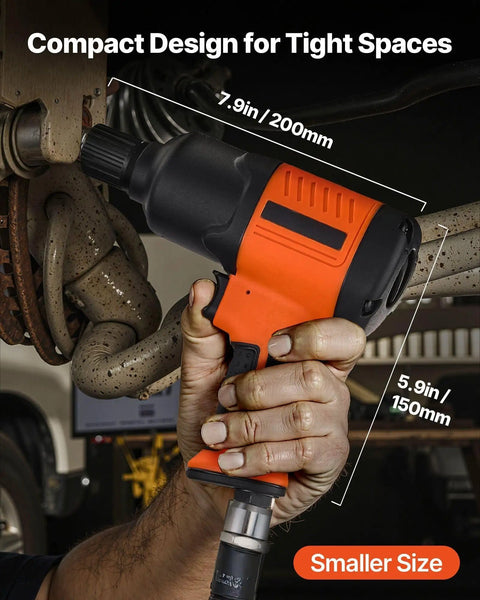Heavy Duty 1/2 Inch Drive Pneumatic Impact Wrench Delivers Badass 1100 Foot Pounds Reverse Torque held in hand with compact design for tight spaces.