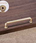 10 Pack 5 Inch Center To Center Brushed Brass Kitchen Cabinet Pulls Zinc Alloy Solid Round Cabinet Handles mounted on wood surface