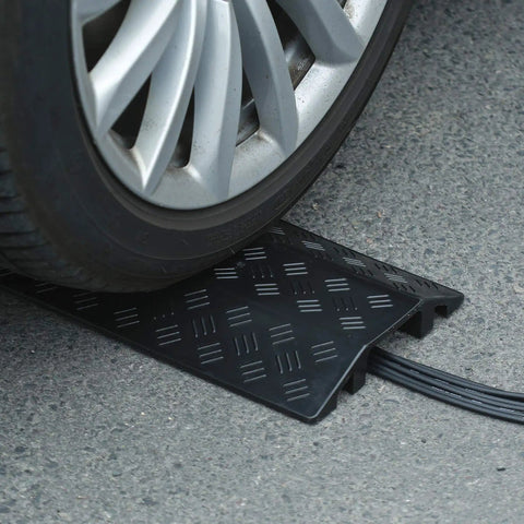 Medium Floor Cord Cover And Cable Ramp Drop Over Trak Protector For Office And Warehouse Heavy Duty PVC Channel Protector 38.5 Inch Length Black One Channel Extendable With T Connector under a car wheel