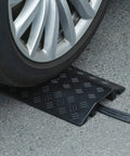 Medium Floor Cord Cover 3 Pack Drop Over Cord Protector Trak Cable Ramp under car tire on road