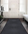Extra Large Heavy Duty Commercial Entrance Rug Top Notch Walk Off Mat Built Tough For Heavy Foot Traffic Water Resistant Boot Scraper Gray Floor Mat in an entryway.
