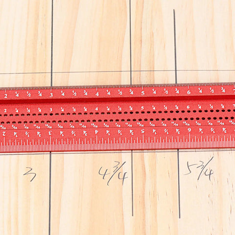 Red Dope T Square Ruler For Woodworking 24in Scriber With Built In Support Lips resting on marked wood surface.