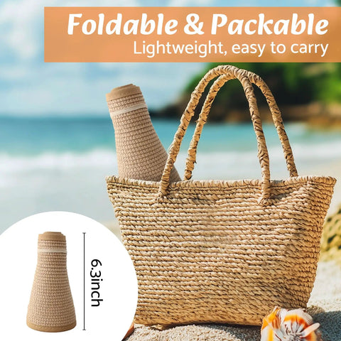 Women's Wide Brim Ponytail Straw Sun Hat Packable Foldable UPF Fifty Plus in a straw bag on the beach