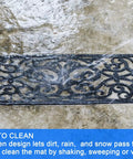 Outdoor Non Slip Rubber Stair Treads Set Of 4 With Stay On Kit Butterfly Design Anti Slip Mats For Steps 30 X 10 Inches Decorative Iron Grill Look Includes Carpet Tape For Easy Install shown during cleaning with water spray showcasing its open grill design letting dirt and rain pass through easily.