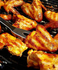 Stainless Steel Barbecue Utensil Set With Carry Bag Professional Grill Tools rust resistant turner flipping chicken wings on grill