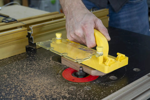 Grr-Rip Block 3D Pushblock System For Table Saws, Smart Pushblock With Gravity Heel in use on a woodworking router table.