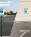 Heavy Duty 18X12 Reserved Parking Van Accessible Handicapped Metal Sign on post in outdoor parking lot for van accessibility.