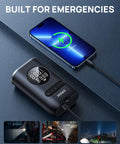 Cordless Tire Inflator With 150 PSI Auto Shut Off Pressure Gauge And LED Light Portable Air Pump in use with phone charging