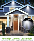 Front view of house with Outdoor Solar Wall Mount Lights Pack of 2 with 80 LEDs, Motion Sensor, 450 Lumens illuminating entrance.