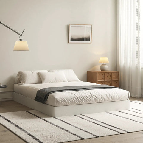 Badass Durability Seven Inch Queen Box Spring With Heavy Duty Steel Frame And Tear Resistant Fabric Cover in a modern bedroom setup.