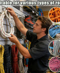 Man arranging ropes on display with Six Pack 304 Stainless Steel Rope Clamps With Thimble Fittings visible, suitable for various ropes.