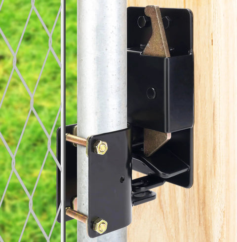 Close-up view of Heavy Duty Two Way Gate Latch mounted on a post, designed for secure farm fencing and livestock pens.