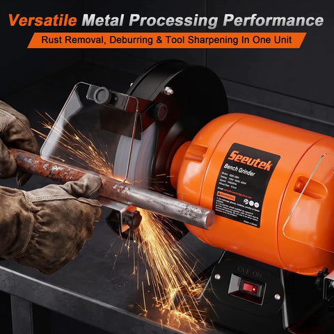 Ironclad 8 Inch Bench Grinder With A Beefy 750 Watt Motor Spinning At 3450 RPM For Sharpening Knives Chisels And Steel Stock Plus Adjustable Tool Rests And Splash Guards For The Garage in use, focusing on metal sharpening and rust removal.