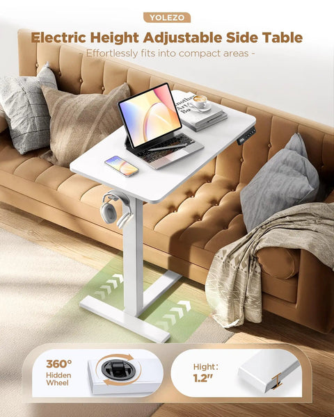 Yolezo 24 By 16 Inch Electric Overbed Table With Rolling Wheels And Smooth Height Adjustment Up To 47 Inches, White Laptop Desk For Bed on a sofa.