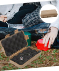 Rugged Outdoor Survival Storage Case Built Tough Shockproof Tool Box for organization, camping, and hiking gear on grass setup