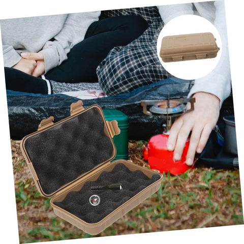 Rugged Outdoor Survival Storage Case Built Tough Shockproof Tool Box for organization, camping, and hiking gear on grass setup