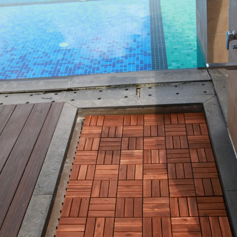 Teak Interlocking Patio Deck Tiles Set of 10 12 Inch by 12 Inch Outdoor Wood Flooring Mats installed by a poolside
