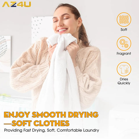 Woman enjoying soft and fragrant towel after drying with laundry machine