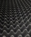 Close-up of Game Changer 4 Pack Sound Proof Foam Panels 48X24X2 Acoustic Egg Crate design for sound absorption.