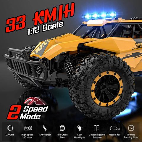 Monster 1 To 12 Scale RC Truck With LED Headlights Rechargeable Battery 33kmh Top Speed Off Road Beast close-up of front wheel and lights
