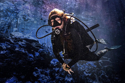 Diver underwater wearing Crux Modular Scuba Diving BCD With 40 Lb Lift Black XLarge Micro Adjust Retention System For Custom Fit Modular Shoulder And Waist Straps The Go To Dive Vest For Any Body Type And All Water Adventures