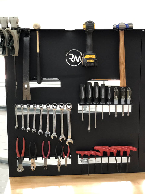 Heavy Duty Workbench With Attachable Tool Organizer, Adjustable And Durable, Built For Garage Or Workshop with tools on black panel