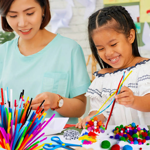 Child creating art with Ultimate Kids Craft Kit With Over 2000 Pieces For Boys And Girls Ages 4 To 9 Mega Arts And Crafts Set