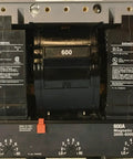 Top Dollar 600 Amp Three Pole Molded Case Circuit Breaker showing labeled switches and 600 Amp capacity, ideal for heavy industry use.