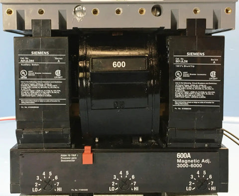 Top Dollar 600 Amp Three Pole Molded Case Circuit Breaker showing labeled switches and 600 Amp capacity, ideal for heavy industry use.