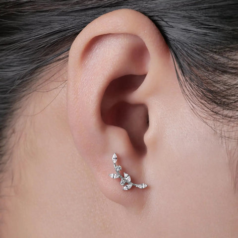 Implant Grade Titanium Screw Back Studs For Sensitive Ears Built Tough And Looking Sick With Zero Allergies Making Them A Straight Up Game Changer For Daily Grind worn in an ear with a sleek, silver shine and gem base.