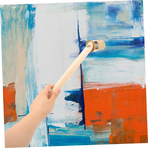 Hand holding wood handle pig bristle paint brush applying acrylic on canvas. Wood Handle Pig Bristle Paint Brush For Acrylics Stain And Wall Painting Awesome For DIY Furniture And House Projects, Versatile Bristle Brush For Smooth Even Coats And Quick Clean Up.
