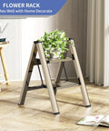 Three Step Folding Ladder Stool With Anti Slip Wide Pedals Aluminum Portable Handy Everyday Use with plant